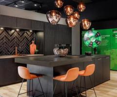 Zwarte showroomkeuken met Quooker en 5 apparaten!