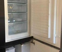 Moderne keuken met eiland en nieuw apparatuur - 9